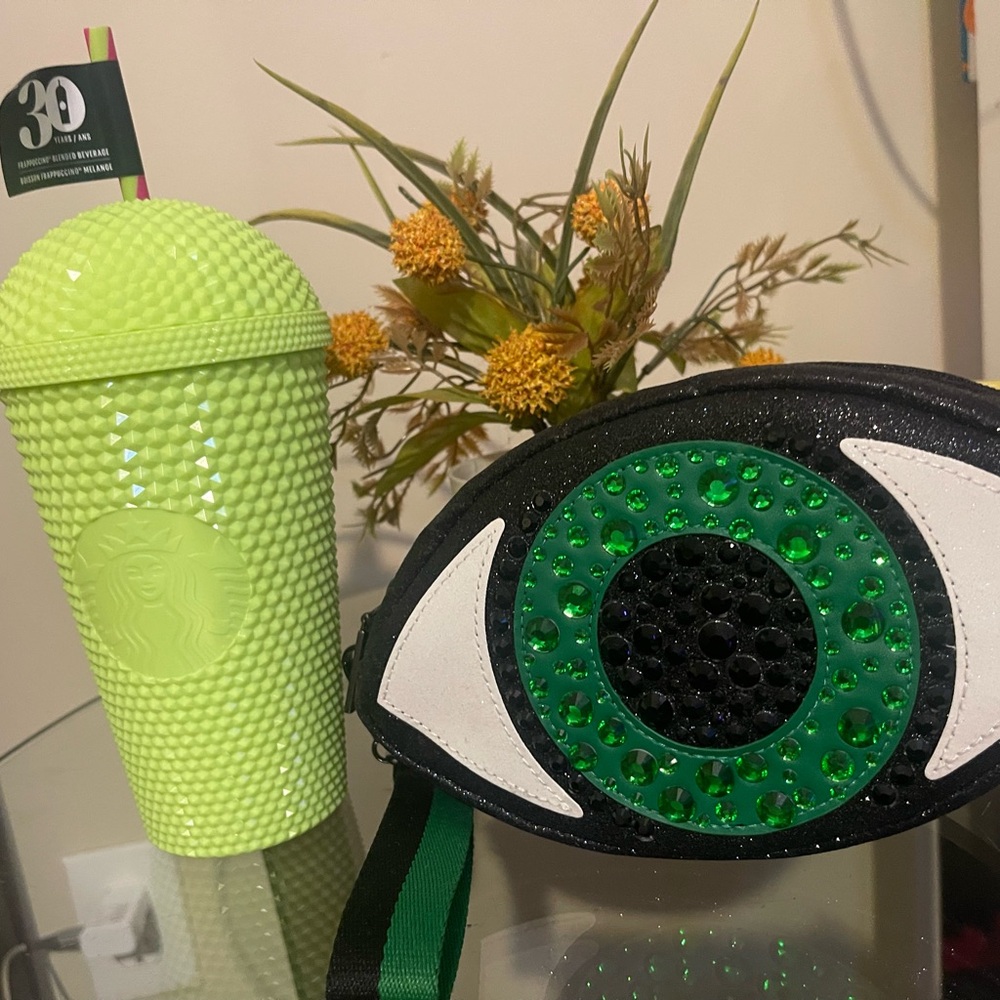 2 pieces: Starbucks cup and Halloween eye makeup bag